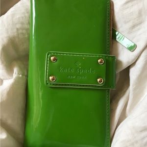 Kate spade.  Kelly green patent by fold wallet